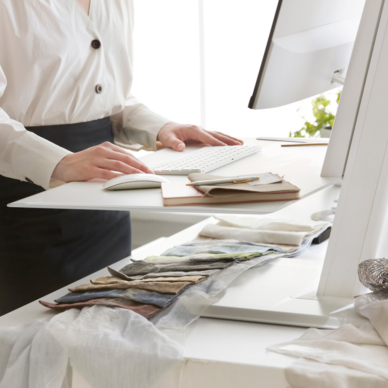 Adjustable Standing Desk in Sitting and Standing Positions