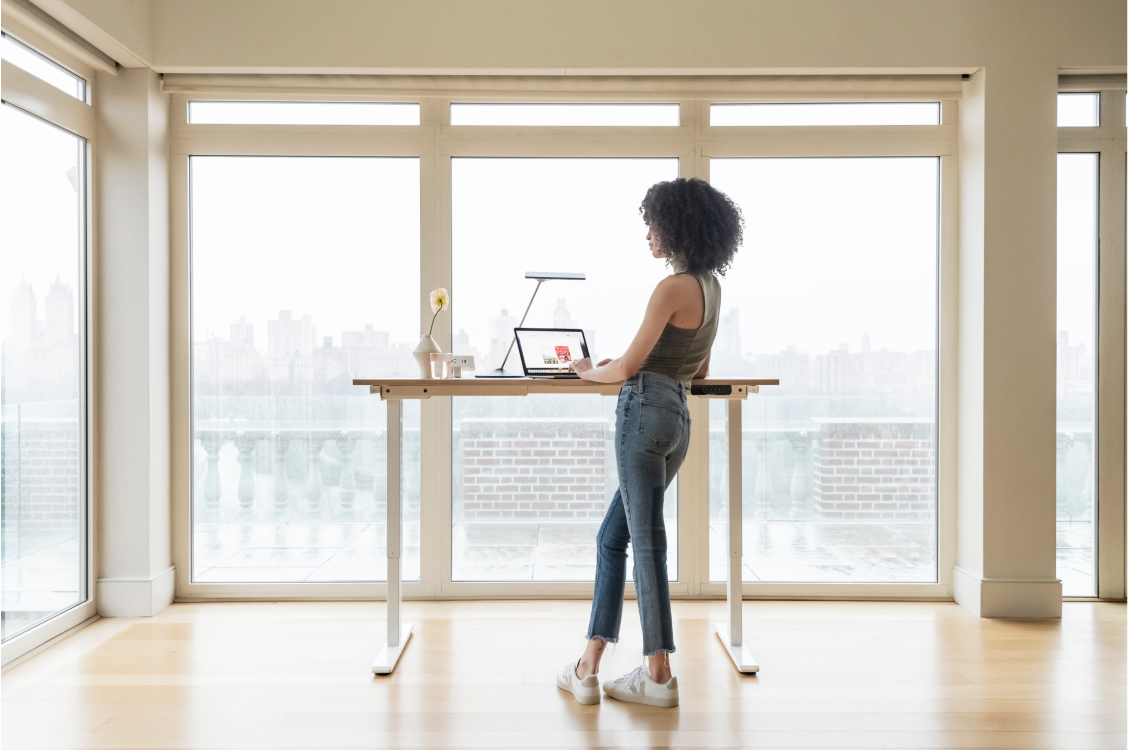 woman standing with eFloat Go 2.0 table