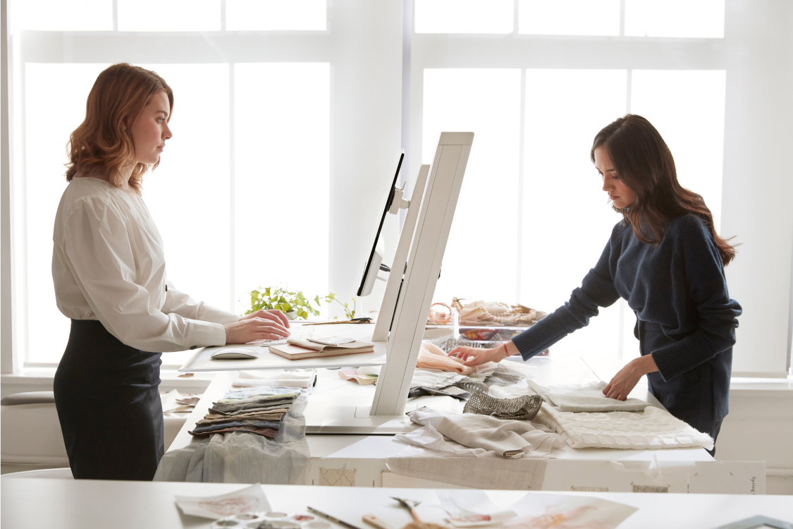 2 women working on QuickStand Eco
