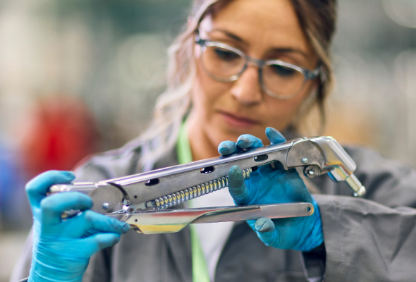 someone testing and inspecting monitor arm