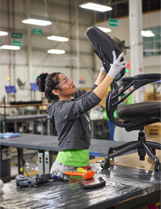 Worker assembling Freedom Task chair