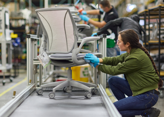 Worker handling World chair